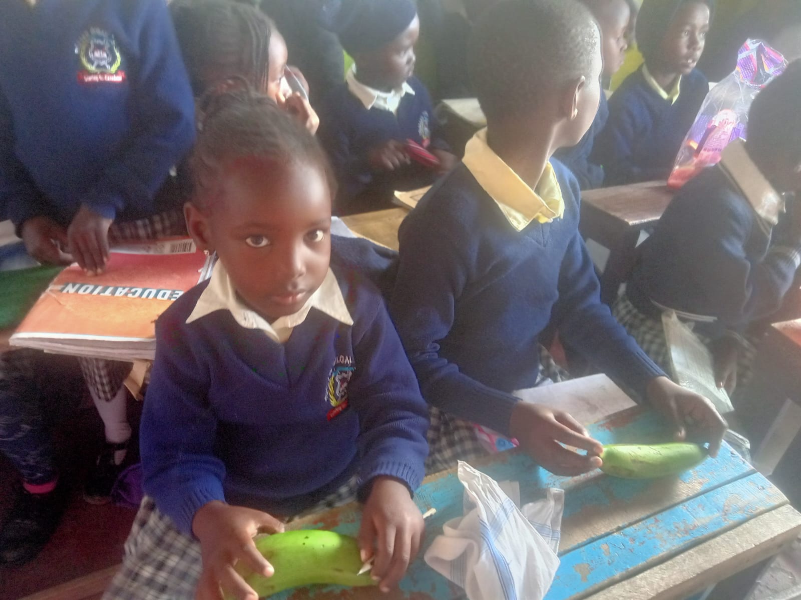 Learners seated at their desks in class